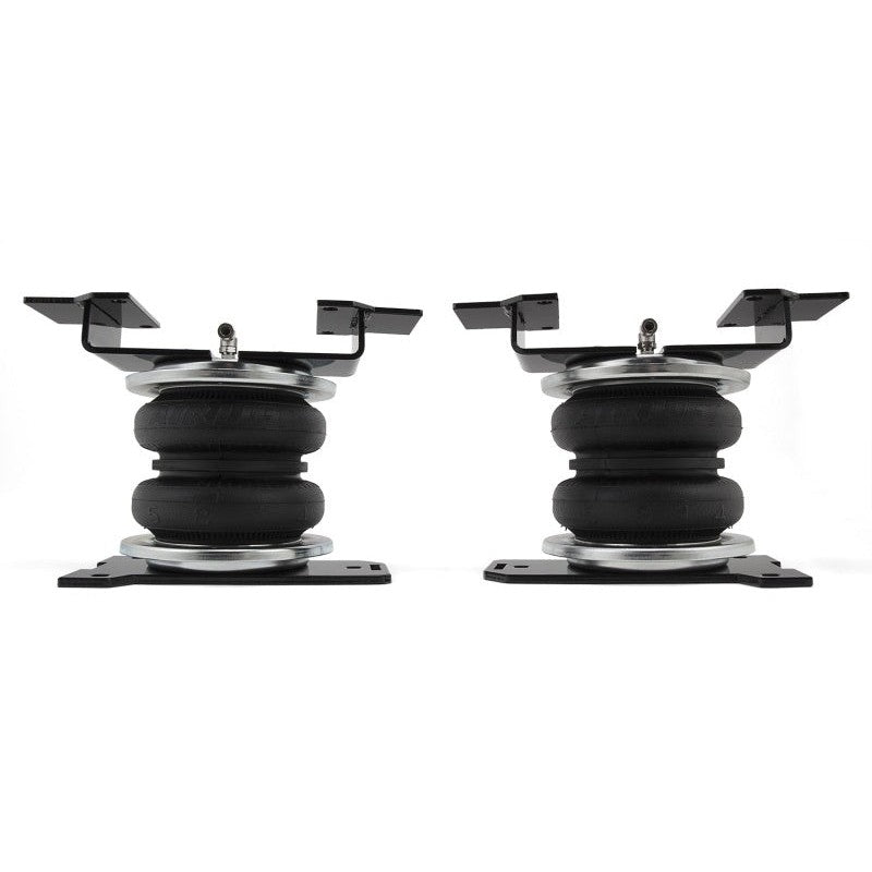 Air Lift LoadLifter 5000 air spring kit including bellows, roll plates, and mounting hardware for Silverado 1500.