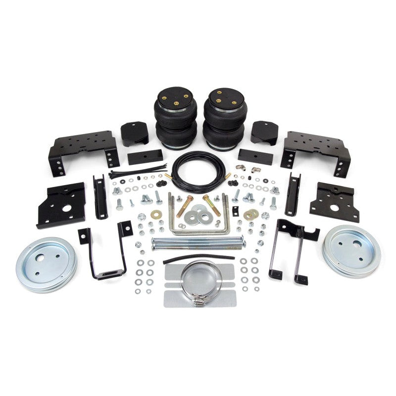 Air Lift LoadLifter 5000 rear air spring kit with 2-ply reinforced springs, roll plates, and mounting hardware.