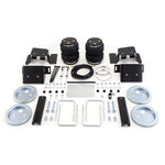 Air Lift 57338 LoadLifter 5000 rear air spring kit featuring heavy-duty bellows, mounting brackets, and roll plates.