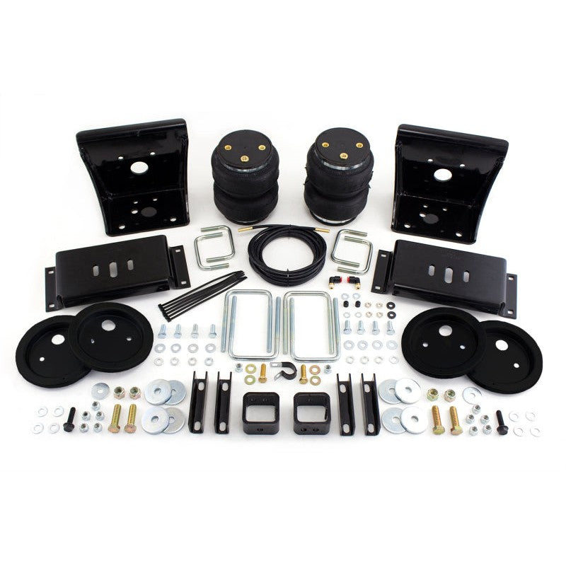 Air Lift 88212 LoadLifter 5000 Ultimate air springs with internal jounce bumpers, mounting brackets, and air line hardware.