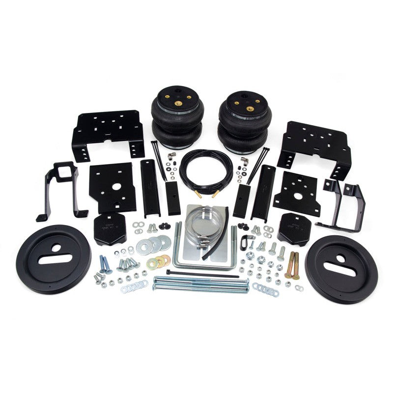 Air Lift LoadLifter 7500XL Ultimate air spring kit featuring heavy-duty bellows, roll plates, and mounting brackets.