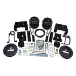 Air Lift LoadLifter 7500XL Ultimate air spring kit featuring heavy-duty bellows, roll plates, and mounting brackets.