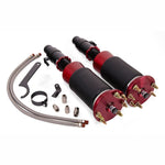 Air Lift Performance 78520 front air struts with red anodized upper mounts and black threaded monotube shock bodies