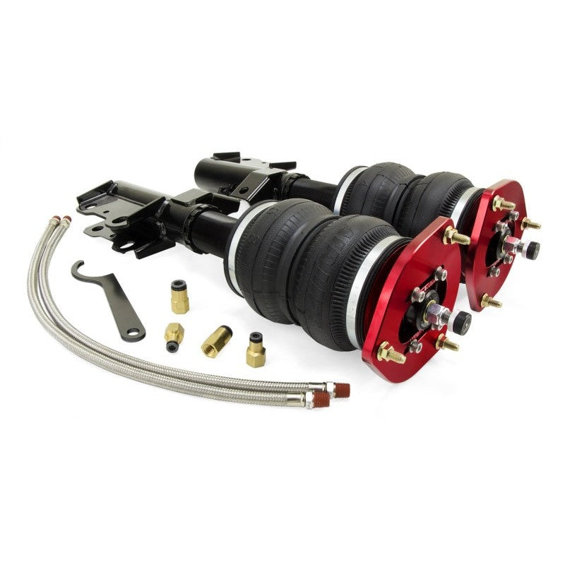Air Lift Performance front air struts with red-anodized camber plates and double-bellow springs for Chevrolet Camaro.