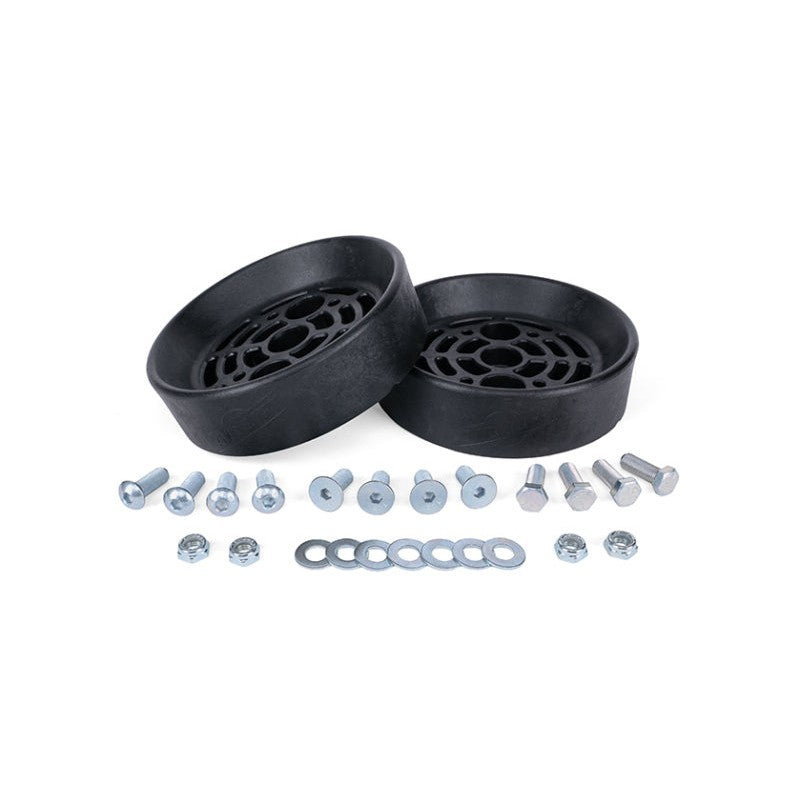 Two black resin Air Lift 52500 universal air spring cradles with mounting hardware.