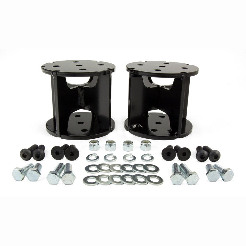 Air Lift 52440 black powdercoated 4-inch straight air spring spacer for lifted truck suspension