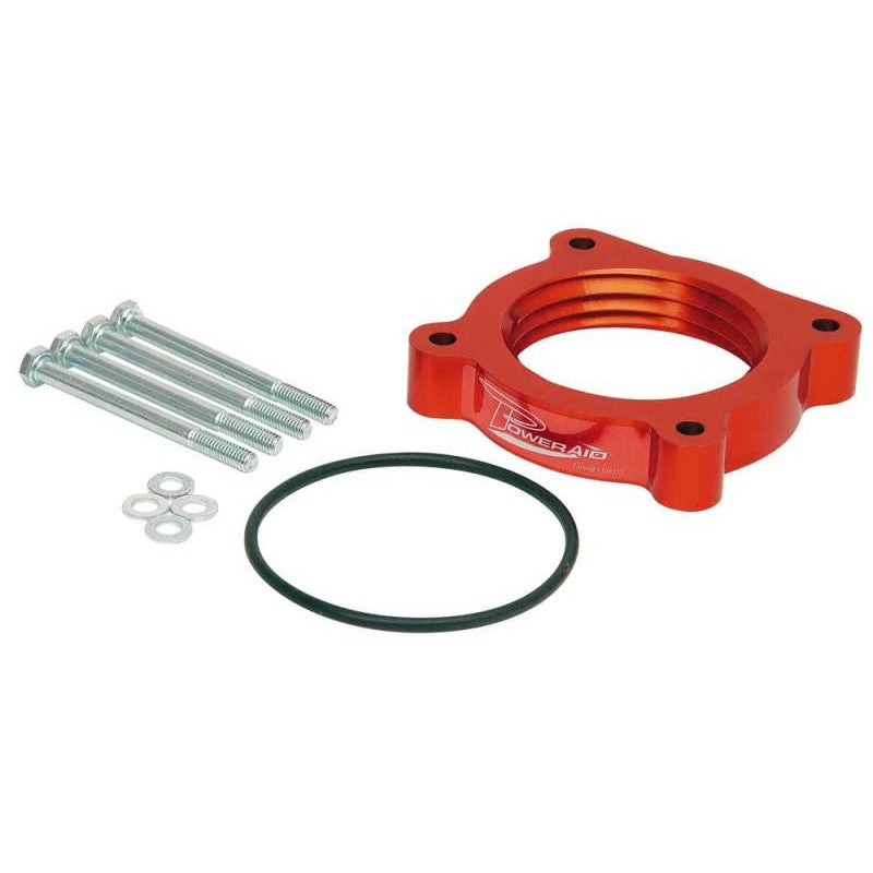 Black Airaid PowerAid throttle body spacer with patented Helix Bore internal rifling for Nissan 5.6L engines.
