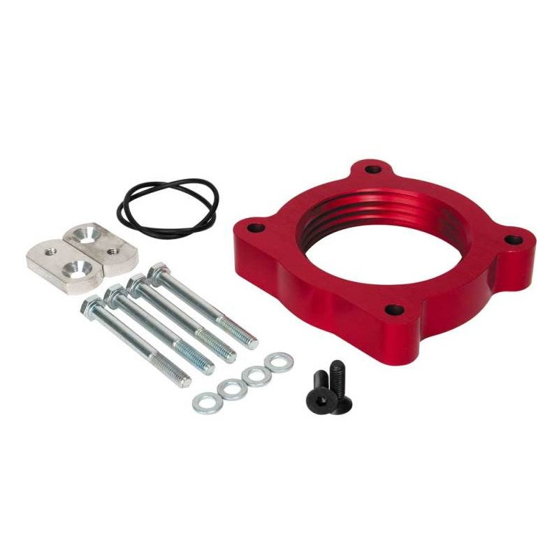 Airaid PowerAid throttle body spacer with patented Helix Bore design for 2005-2019 Nissan and Suzuki trucks.