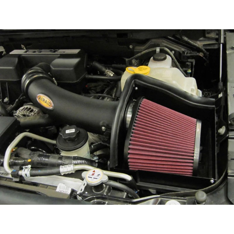 Airaid Cold Air Dam intake system with black intake tube and red dry synthetic air filter for 6.2L Ford F-150.