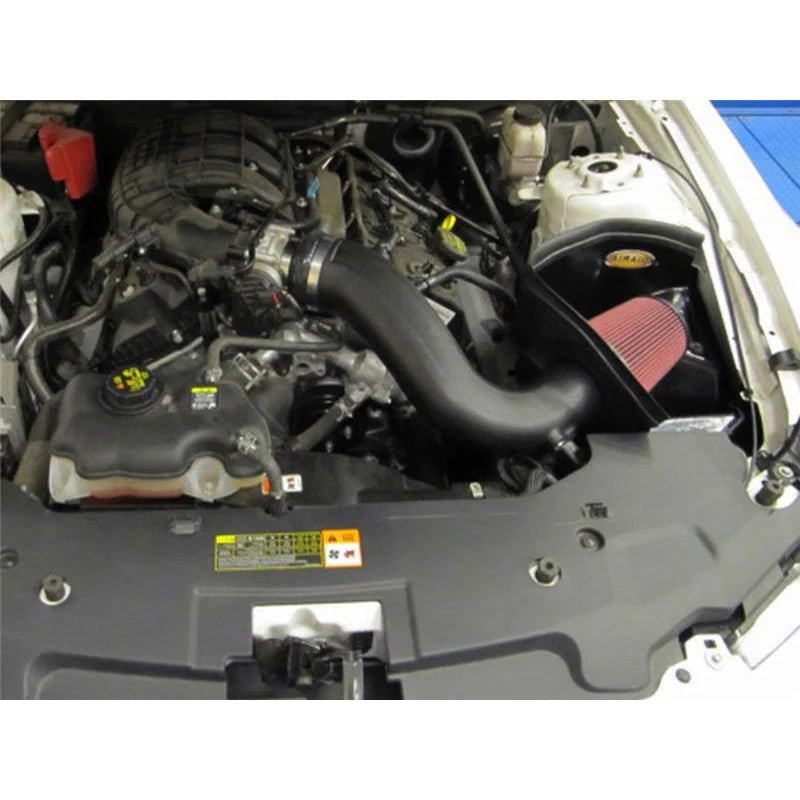 Airaid MXP cold air intake system for 3.7L Mustang featuring a black roto-molded air box and dry red synthetic air filter.