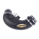 Airaid black high-density polyethylene modular intake tube with red silicone couplers and stainless steel worm gear clamps