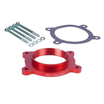 Airaid PowerAid throttle body spacer with patented Helix Bore interior design for 5.3L Chevrolet and GMC engines.