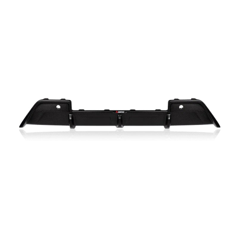 Akrapovic high-gloss carbon fiber rear diffuser with parking sensor mounts for 2020 BMW X5 M and X6 M.