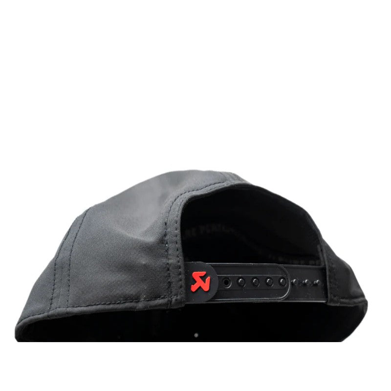 Black Akrapovic logo baseball cap with functional quick-dry fabric and adjustable plastic snapback closure.