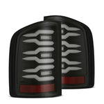 AlphaRex Luxx-Series LED tail lights with black housings and smoked lenses for 2007-2014 Chevrolet Silverado.