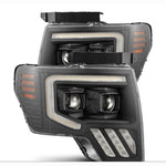 AlphaRex PRO-Series black projector headlights for 2009-2014 Ford F-150 with plank-style DRL and sequential signals.
