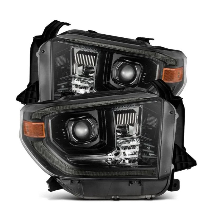 AlphaRex PRO-Series black housing projector headlights for 2014-2021 Toyota Tundra with sequential signals and DRL.