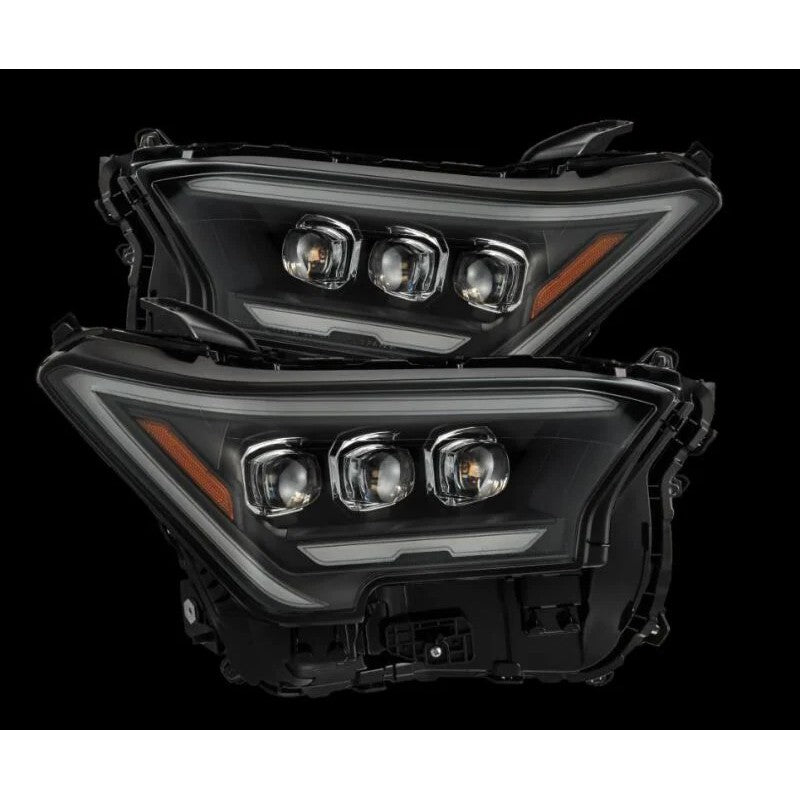 AlphaRex NOVA-Series black housing projector headlights with LED activation light for 2024 Toyota Tacoma.