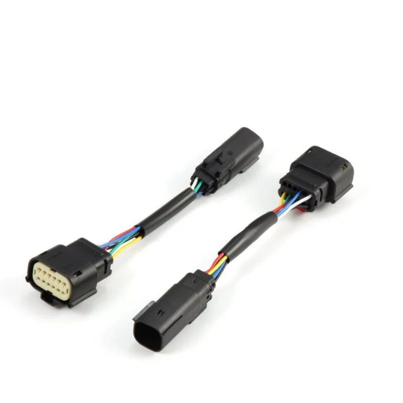 AlphaRex wiring harness converters for 2024 Chevrolet Silverado 2500HD and 3500HD stock tail lights.