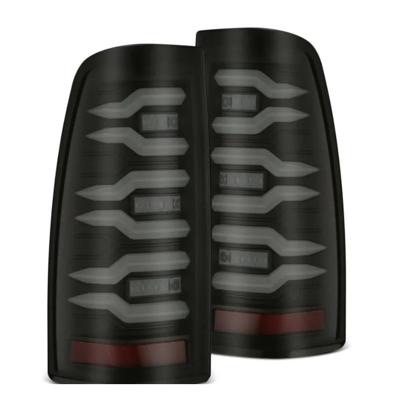 AlphaRex LUXX-Series LED tail lights with black housings and clear lenses for 1999-2006 Silverado and Sierra trucks.