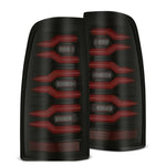 Pair of AlphaRex LUXX-Series LED tail lights with black housings and red lenses for 1999-2006 Silverado and Sierra.