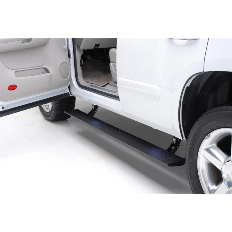 Black AMP Research PowerStep electric running board with LED illumination installed on a Ram 1500.