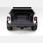 Black AMP Research BedXtender HD Sport aluminum bed extender installed on a Jeep Gladiator with the tailgate open