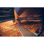 AMP Research PowerStep XL electric running boards in retracted and extended positions for 2025 Ram 2500/3500