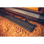 Black AMP Research XL PowerStep electric running boards with integrated rocker rails on a 2021-2025 Ford Bronco.
