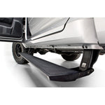 Retractable AMP Research PowerStep XL electric running boards with integrated LED lights for Ford F-150.
