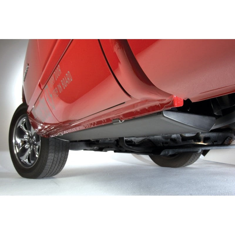 Black AMP Research PowerStep electric running boards with integrated LED lights and plug-and-play wiring harness.