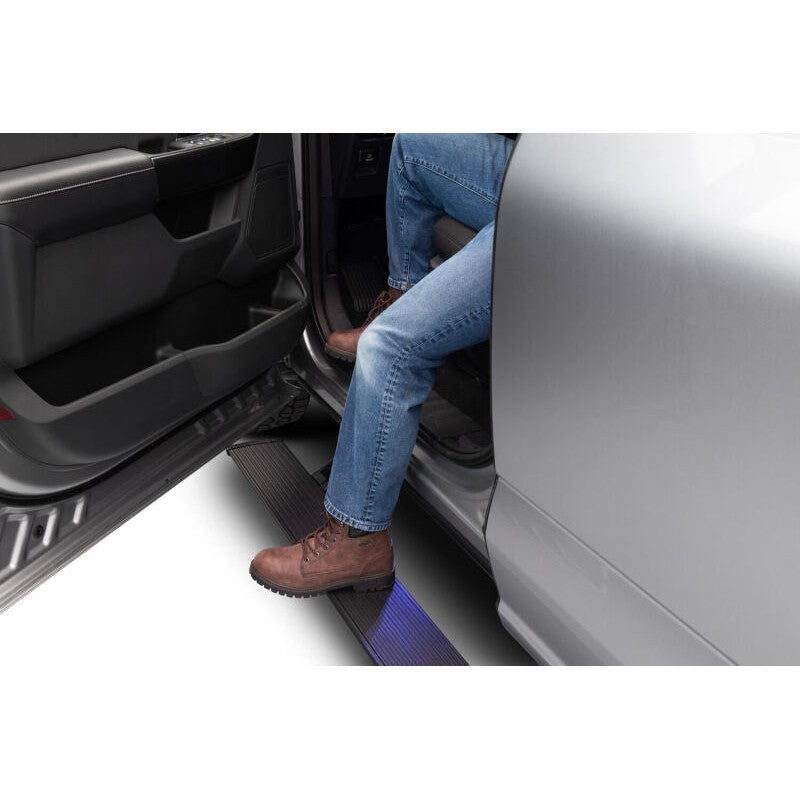 Black AMP Research PowerStep XL electric retractable running boards installed on a 2024-2026 Ford Ranger.