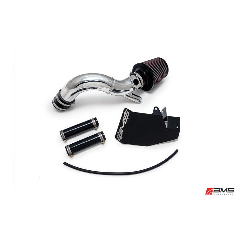 Polished aluminum intake pipe for Mitsubishi Evo X with integrated MAF housing and vacuum bungs.
