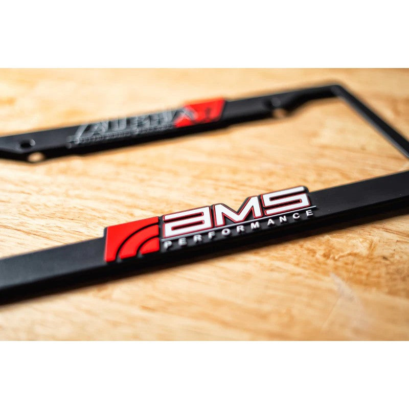 License plate frame with AMS Performance and Alpha series branding
