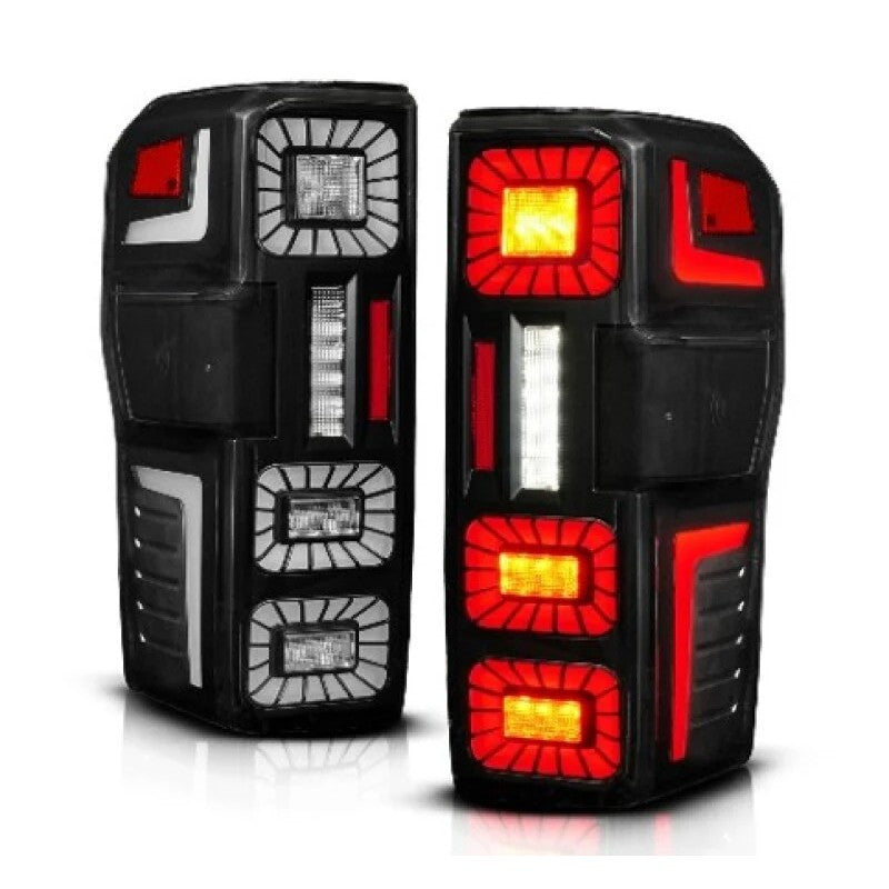 Pair of ANZO black housing LED tail lights with sequential signals for 2023-2026 Ford Super Duty trucks.