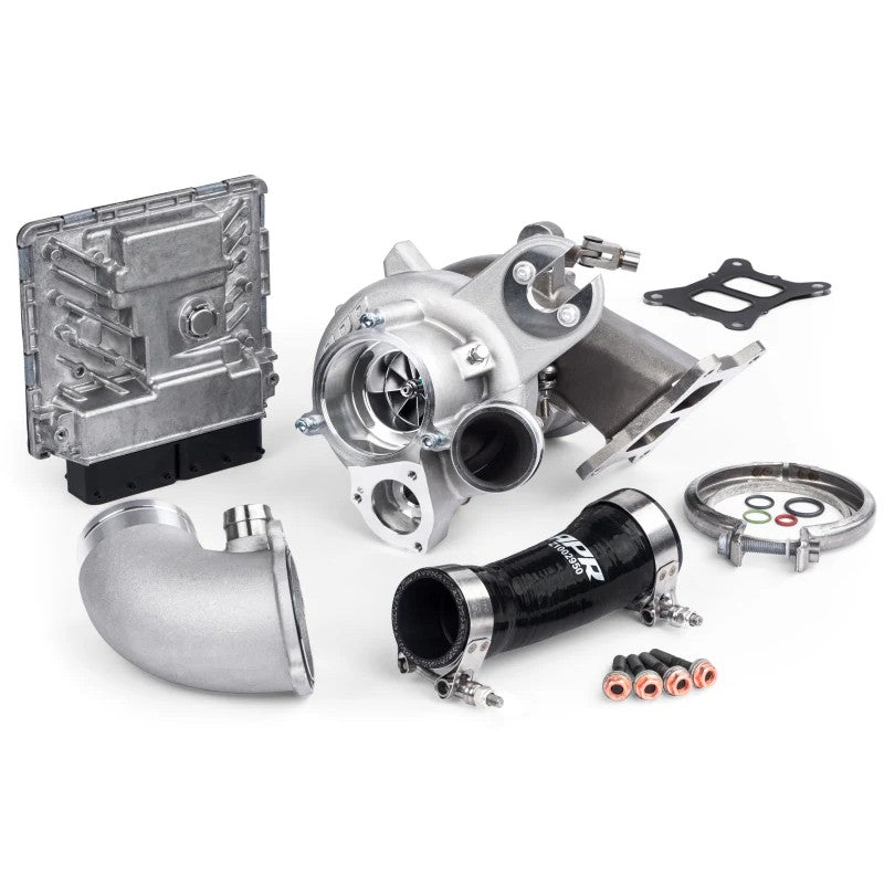 APR DTR6054 turbocharger system with stainless steel housing, billet compressor wheel, and silicone discharge hose.