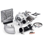 APR DTR6054 turbocharger system with stainless steel housing, billet compressor wheel, and silicone discharge hose.