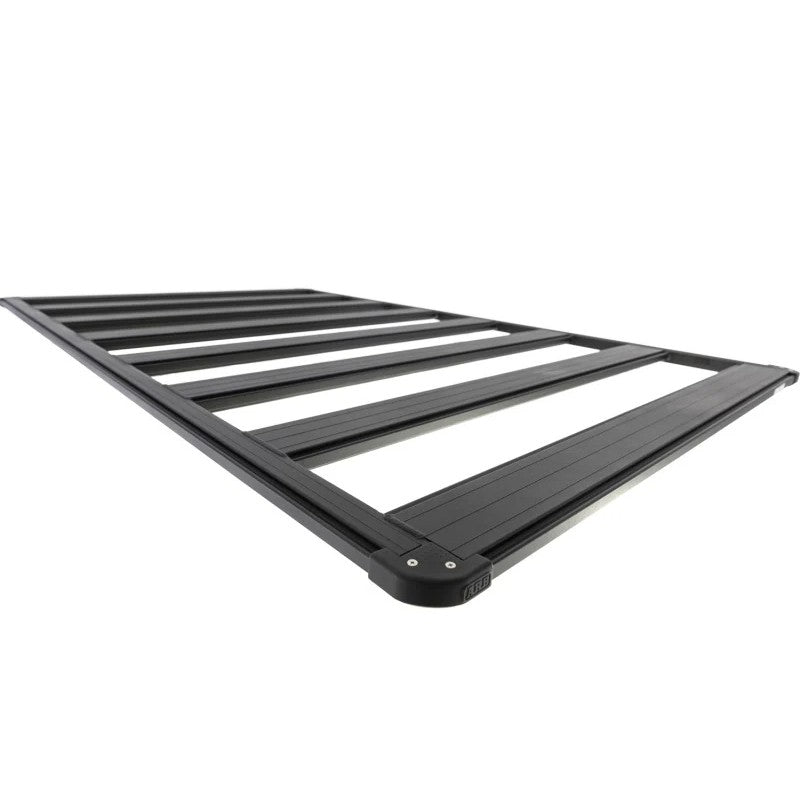 ARB BASE Rack textured black aluminum roof platform 2125mm x 1285mm showing dovetail mounting beams.
