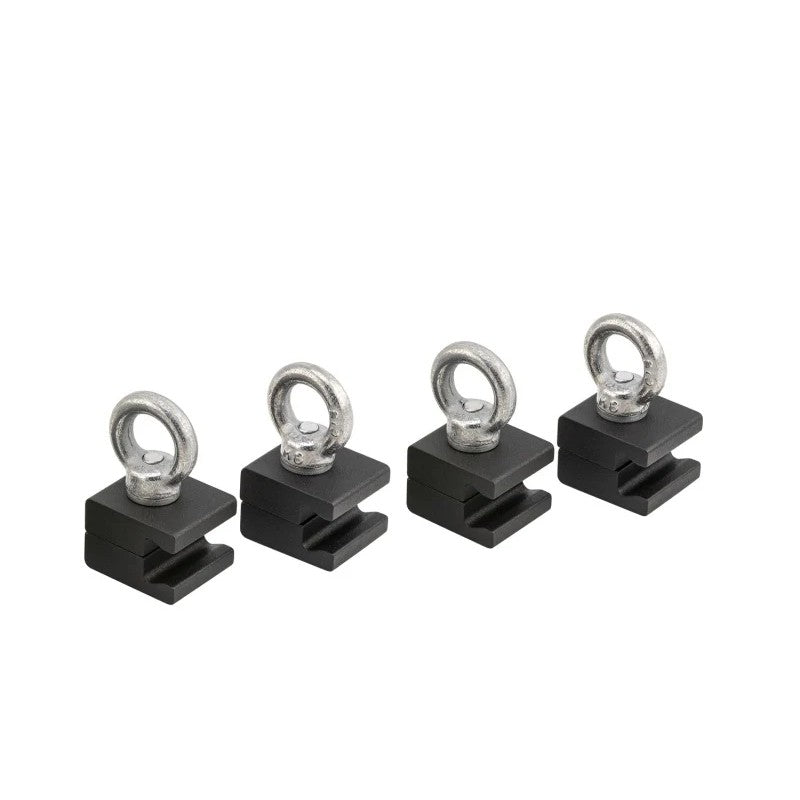 ARB BASE Rack tie down eyebolt kit featuring forged steel eye nuts and black powder-coated aluminum dovetail mounts.