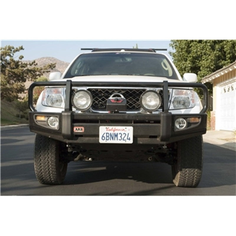 Black powder-coated ARB Deluxe steel front combination bar bumper for 2009-2017 Nissan Frontier.