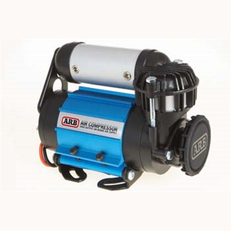 ARB CKMA24 24V High Output on-board air compressor with blue anodized mounting bracket and wiring harness.