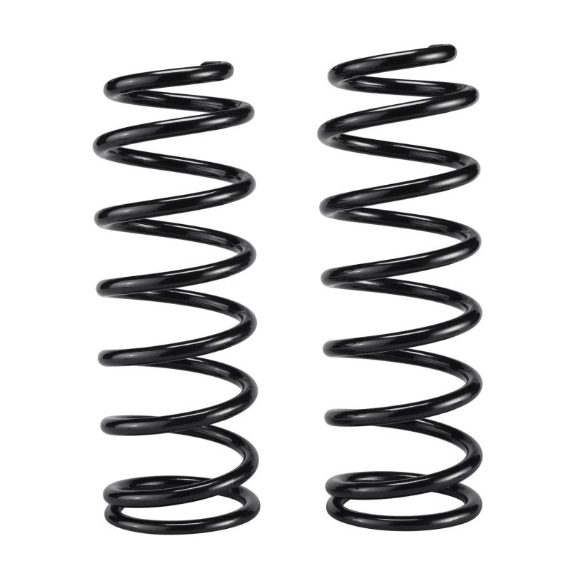 Black powder-coated Old Man Emu 2863J heavy-duty coil spring for 4WD suspension systems.