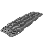 Gun metal grey ARB TRED Pro recovery boards with black traction teeth and integrated carrying handles.