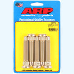 Close-up of silver ARP M14 wheel studs with knurled bases and extended threaded shanks.