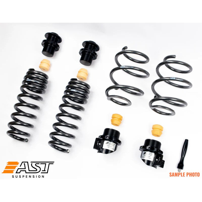 AST height-adjustable lowering springs with threaded collars and progressive coils for BMW G20/G21/G42.