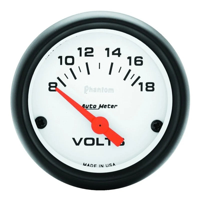 AutoMeter Phantom series 52mm white face electronic voltmeter gauge with 8-18V range and mounting hardware.