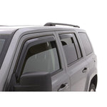 Four smoke-tinted AVS in-channel window deflectors for front and rear doors of a 2007-2017 Jeep Patriot.