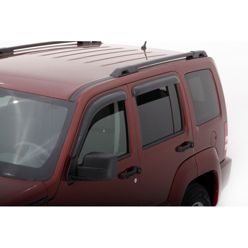 Four-piece set of AVS smoke-finish acrylic window deflectors for 2008-2012 Jeep Liberty models.