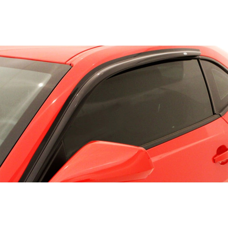 Smoke-finished AVS Ventvisor outside mount window deflectors installed on a 2010-2024 Chevrolet Camaro.