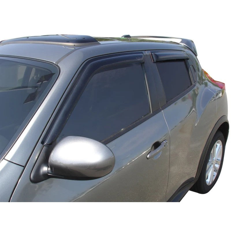 Four-piece set of smoke-tinted AVS Ventvisor outside mount window deflectors for Nissan Juke.